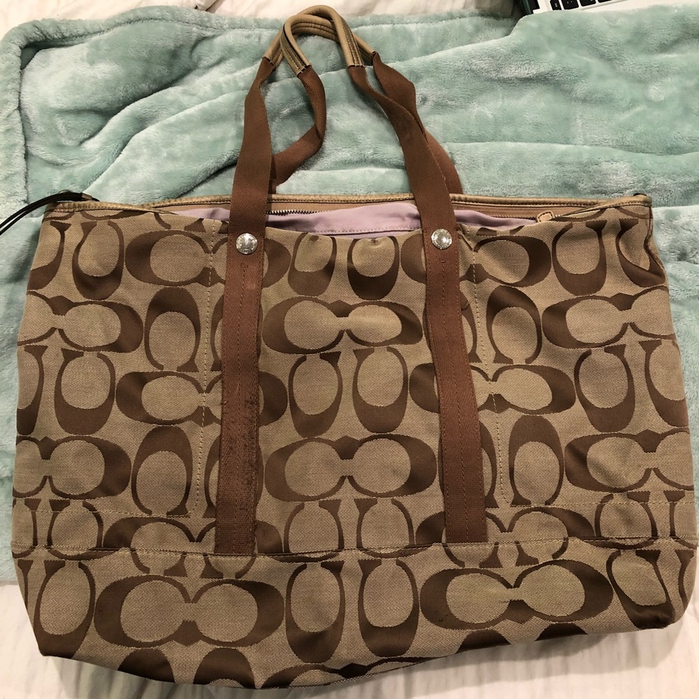 Large gold Coach brand tote bag